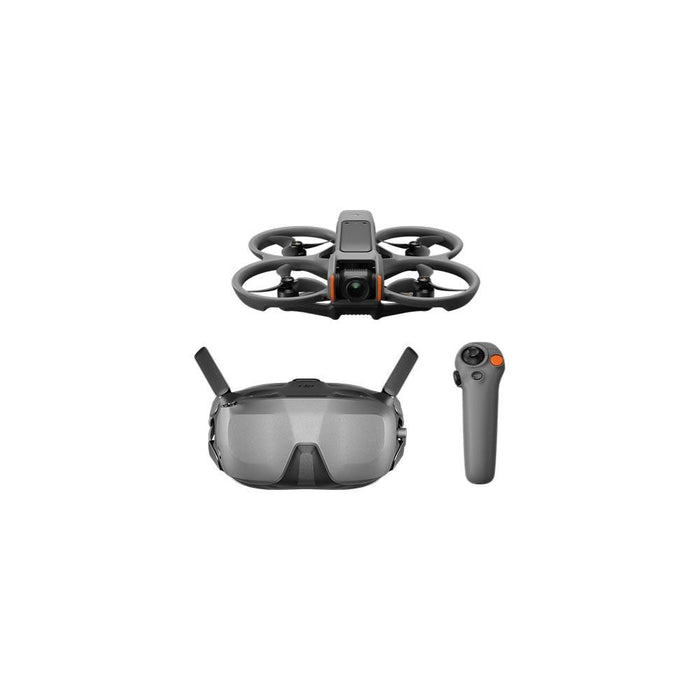 Drone, goggles, and remote control on a white background