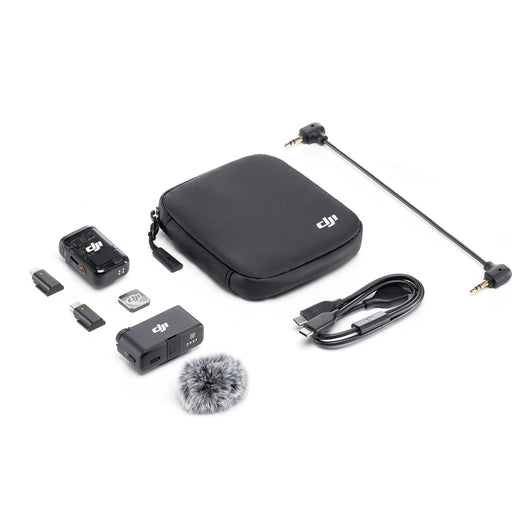 DJI accessory kit with a black carrying case and various components on a white background