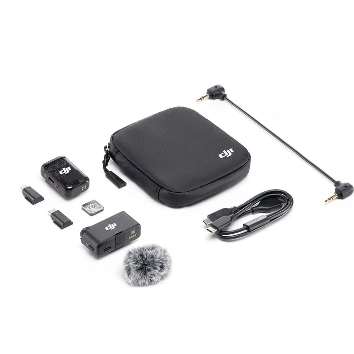 DJI accessory kit with a black carrying case and various components on a white background