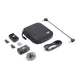 DJI accessory kit with a black carrying case and various components on a white background