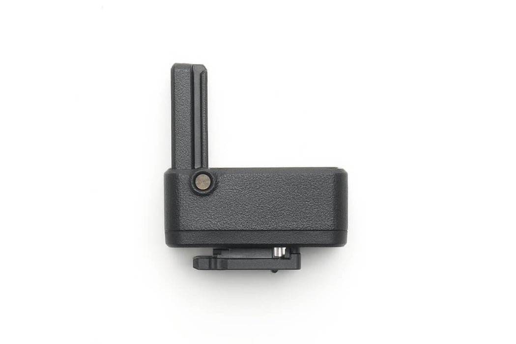 Black camera accessory on a white background