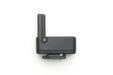 Black camera accessory on a white background