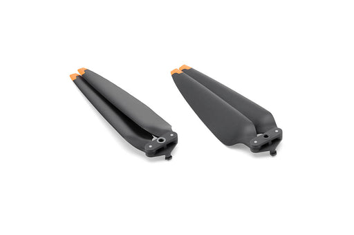 Two black propellers with orange accents on a white background