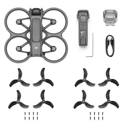 DJI drone with propellers and accessories on a white background