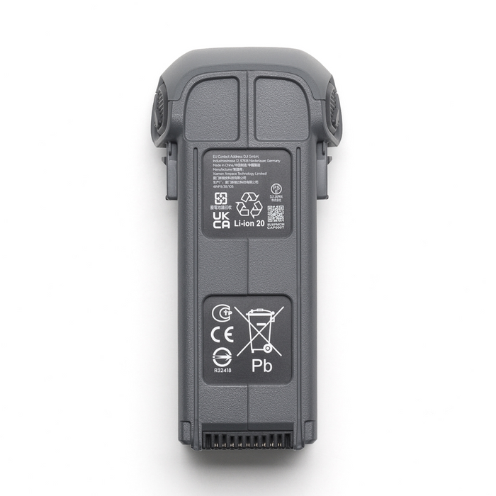 Back view of a gray battery pack with certification labels on a white background