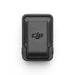 Black device with DJI logo on a white background
