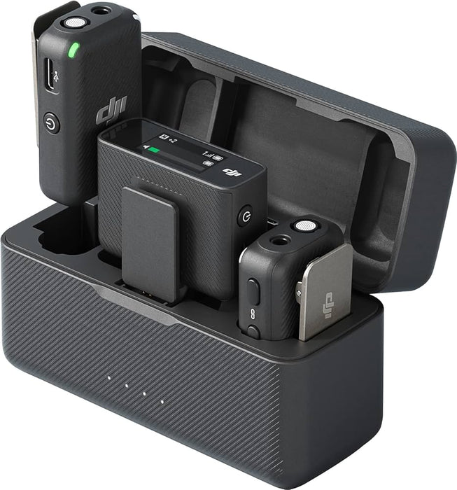 Black wireless microphone system with receiver and transmitter on a charging stand