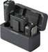 Black wireless microphone system with receiver and transmitter on a charging stand