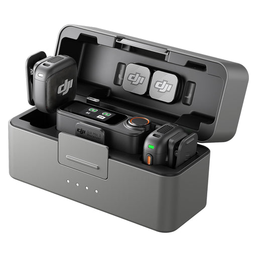 DJI electronic device with charging station on a white background