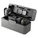DJI electronic device with charging station on a white background