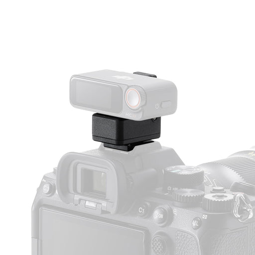 Camera with a mounted external light on a white background