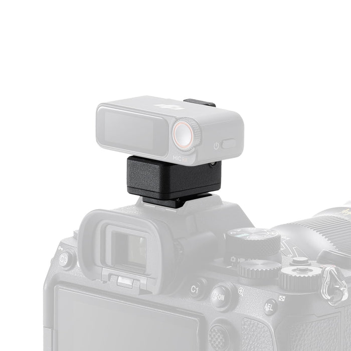 Camera with a mounted external light on a white background