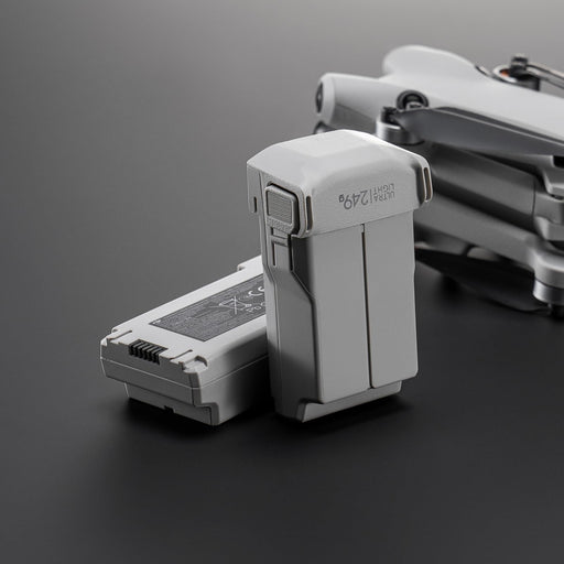 Gray electronic device with a battery on a dark gray background