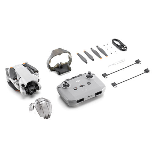 DJI Mini 4 drone and accessories on a white background