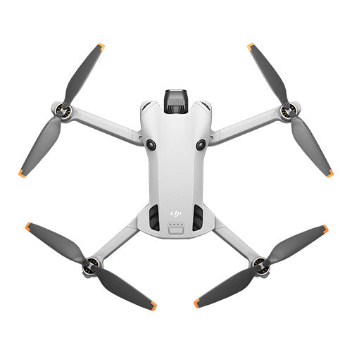 White drone with four propellers on a white background