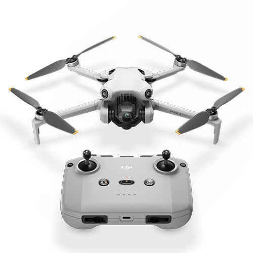 Drone with camera and remote control on a white background