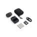 Osmo action camera with accessories on a white background