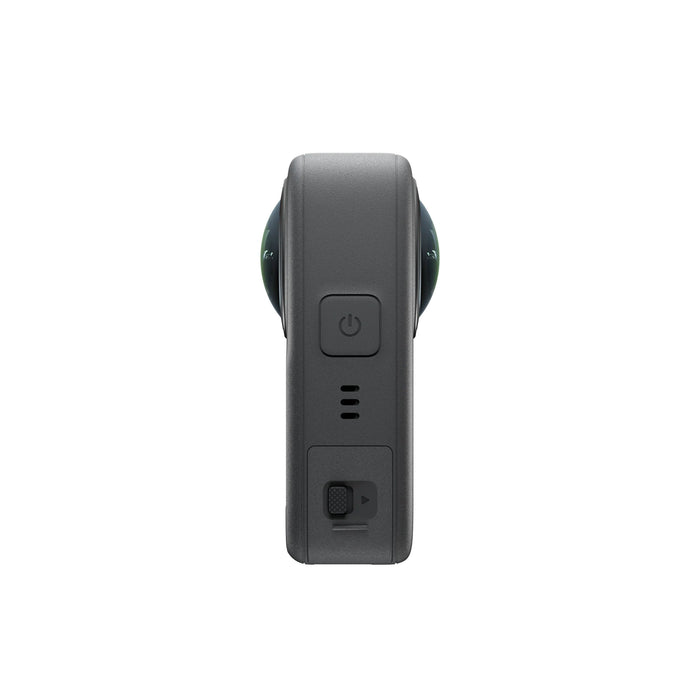 Side view of a gray electronic device with power button on a white background