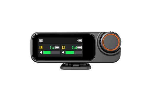 Black and orange electronic device with display and control knob on a white background