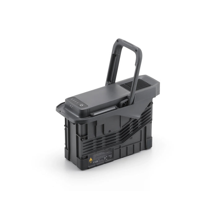 Black portable light with handle on a white background