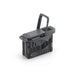 Black portable light with handle on a white background