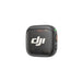 Black device with DJI logo on a white background