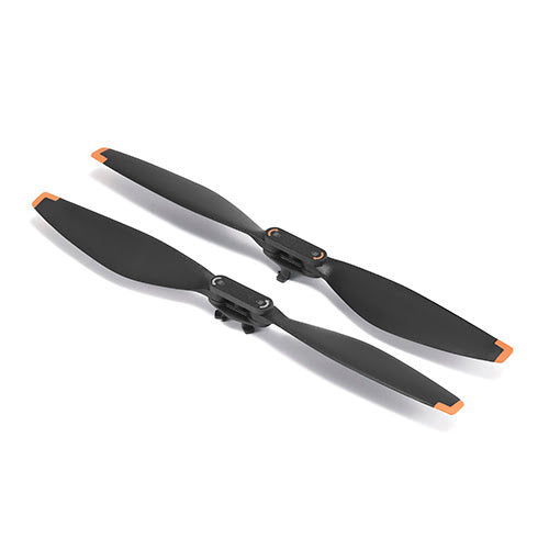 Two black propellers with orange accents on a white background