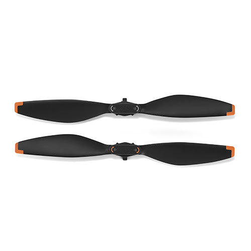 Two black propellers with orange accents on a white background